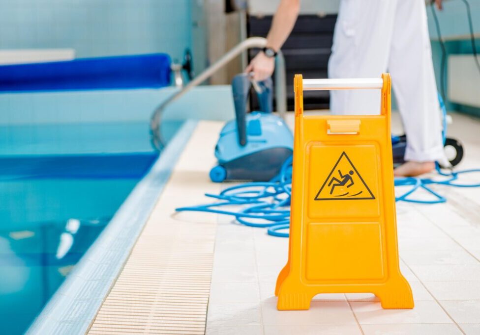 a slippery sign on the pool